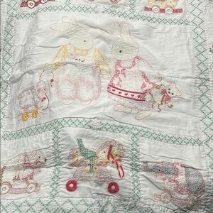 White and Pink Quilted Bedding with Whimsical Embroidery